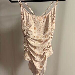 Cider Cream One-Piece Swimsuit with Gold Celestial Print